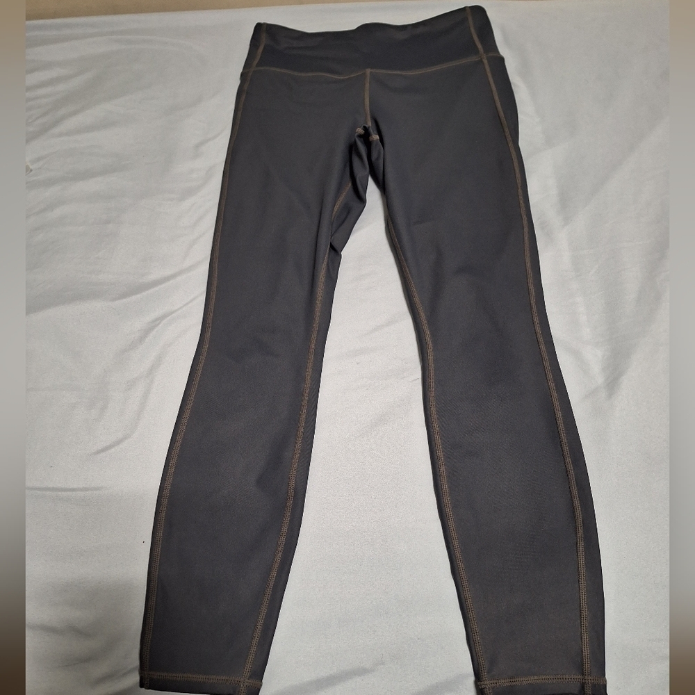 Athleta Leggings dark gray in a womens small. Pre-loved and in excellent conditi
